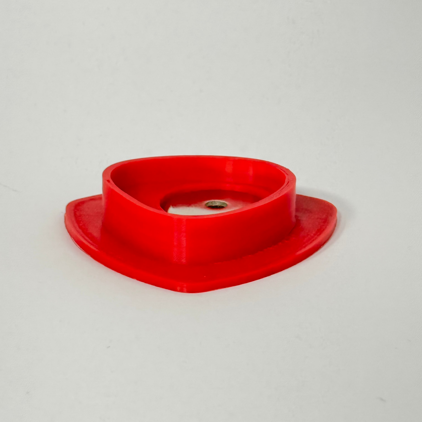 Magnetic mount for Milwaukee M12 batteries, enhancing stability and storage convenience on metal surfaces.