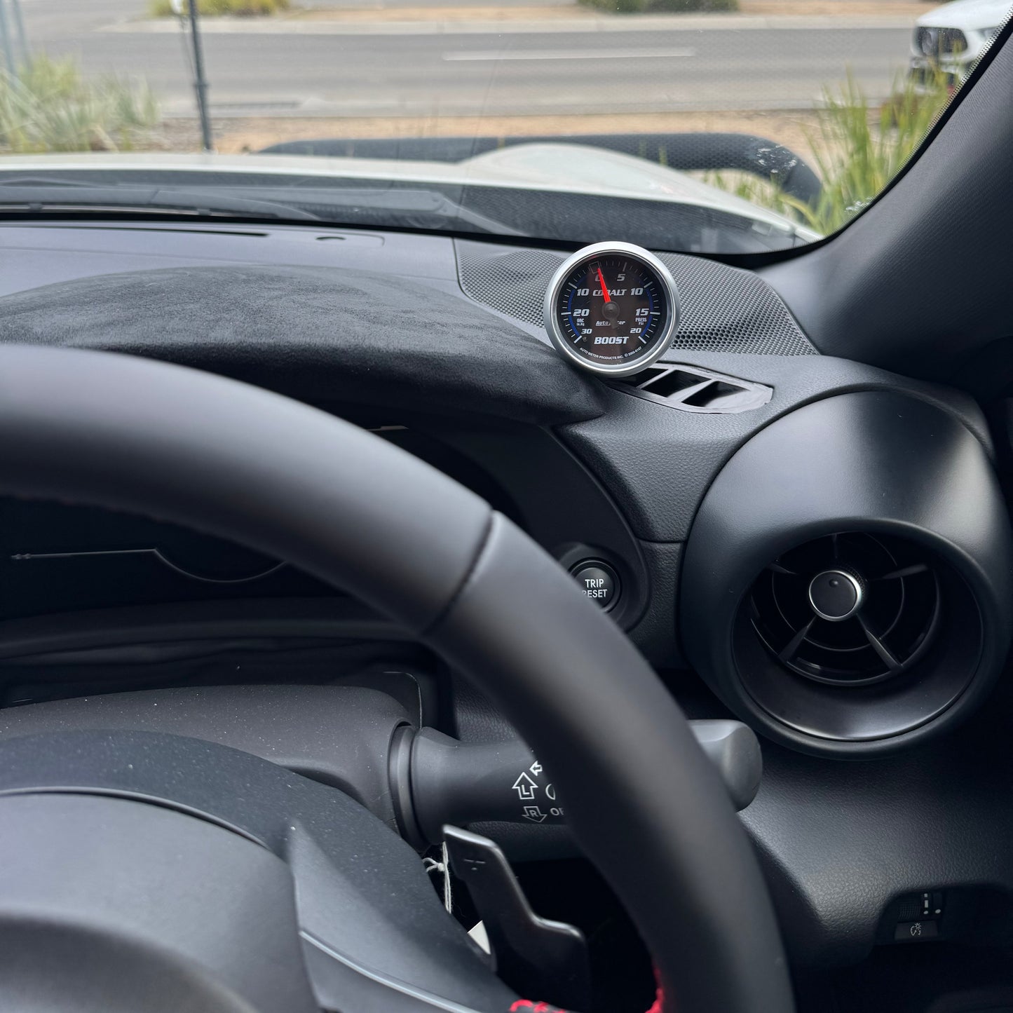 Toyota GR86 vent gauge pod aligned for install in OEM vent position