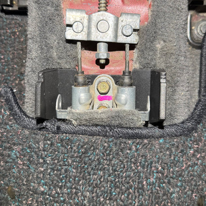 Top view of Honda Civic EK armrest bracket showing bolt pattern for easy installation.