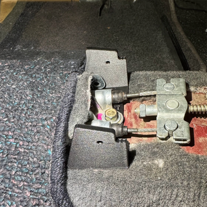 EK Civic armrest bracket fitment view with screws/fasteners shown for OEM-style replacement install.