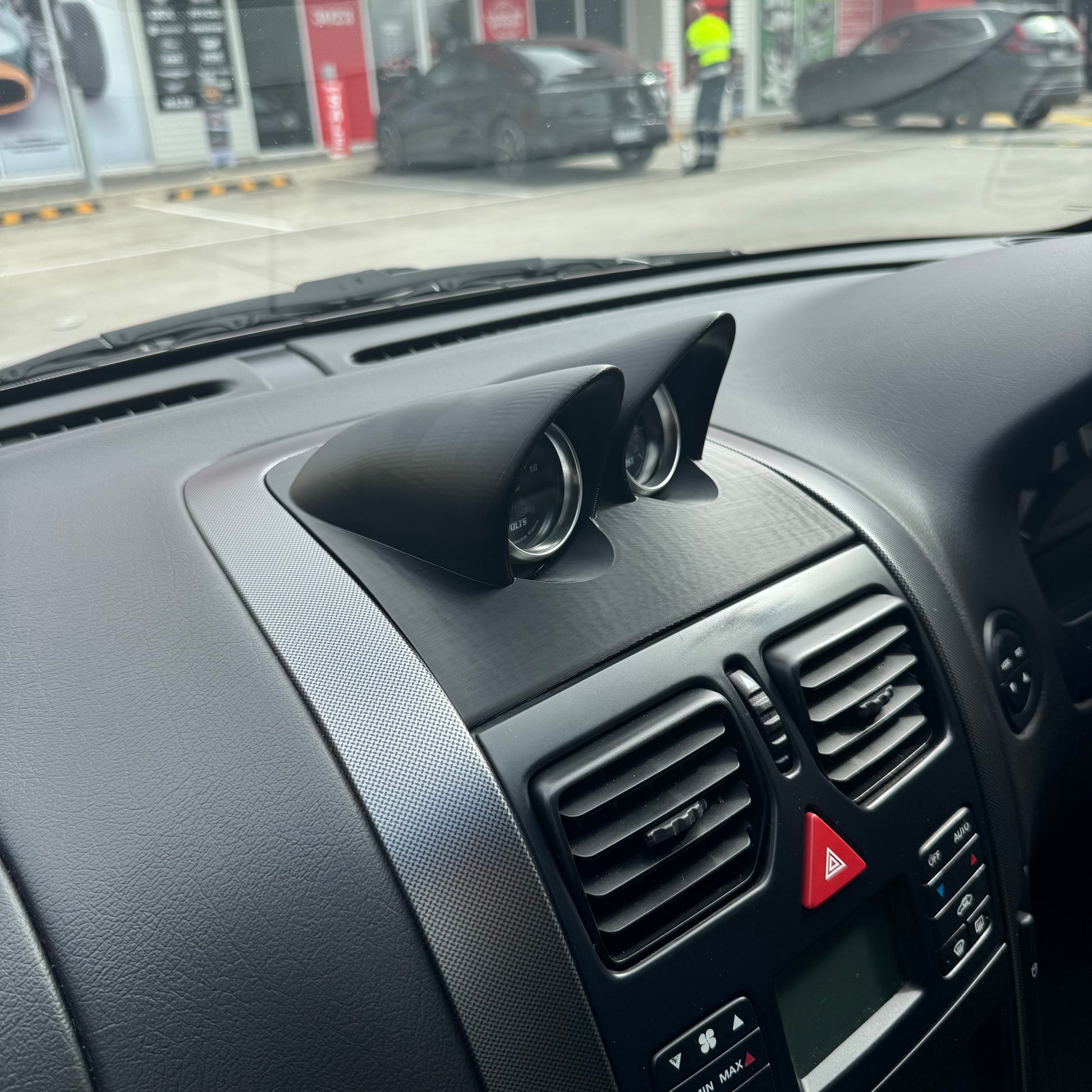 Wide interior shot of unpainted VY/HSV binnacle gauge pod installed, showing overall dash integration and gauge position.