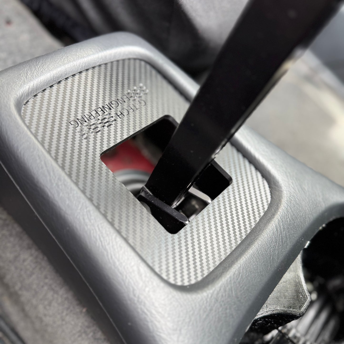 Carbon fiber finish EK Civic short shifter plate for B series engine – lightweight and durable upgrade.