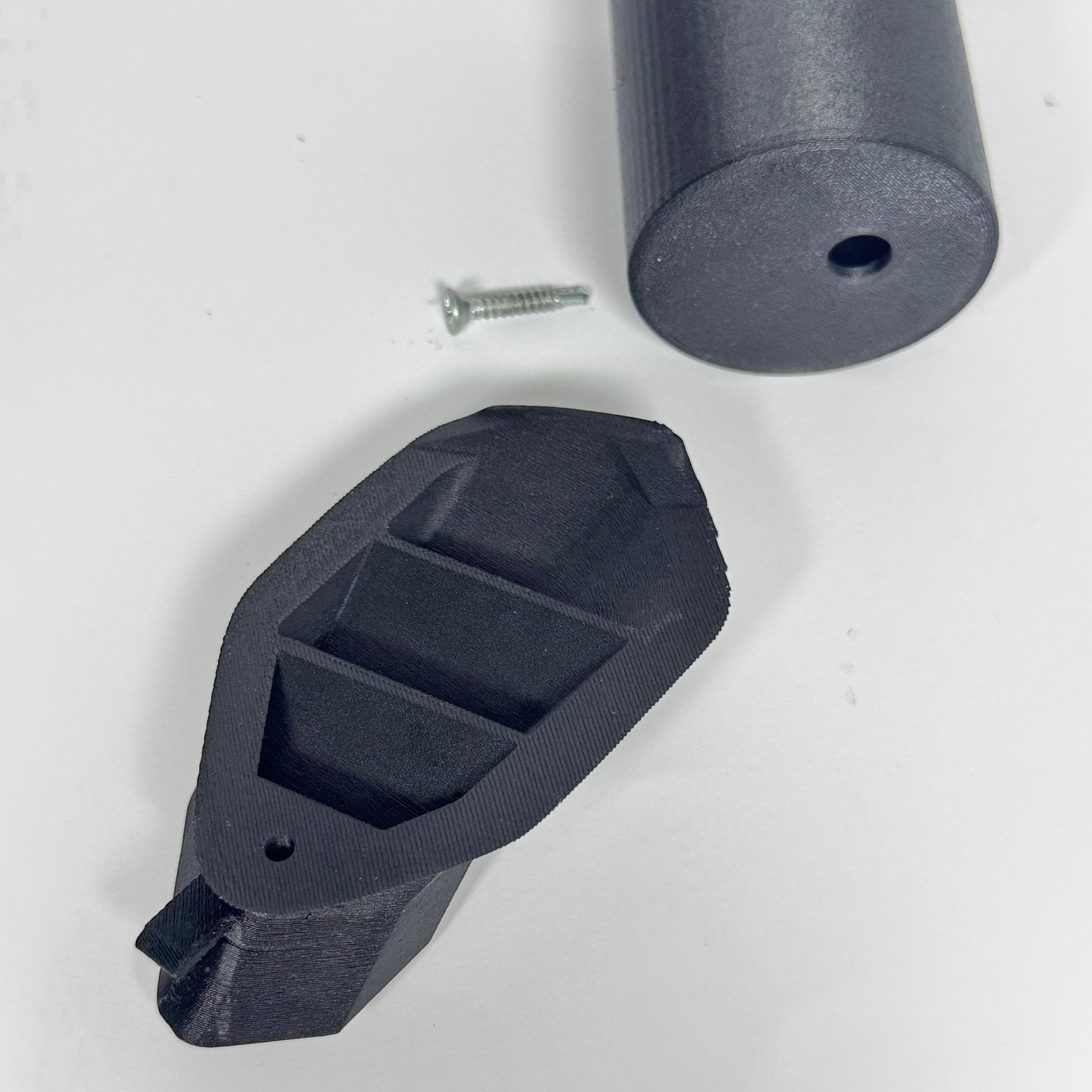 Uninstalled 52mm gauge pod showing carbon fibre polycarbonate construction