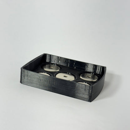 Durable magnetic base for Milwaukee M18 batteries, perfect for organizing tools with shatterproof TPU construction.