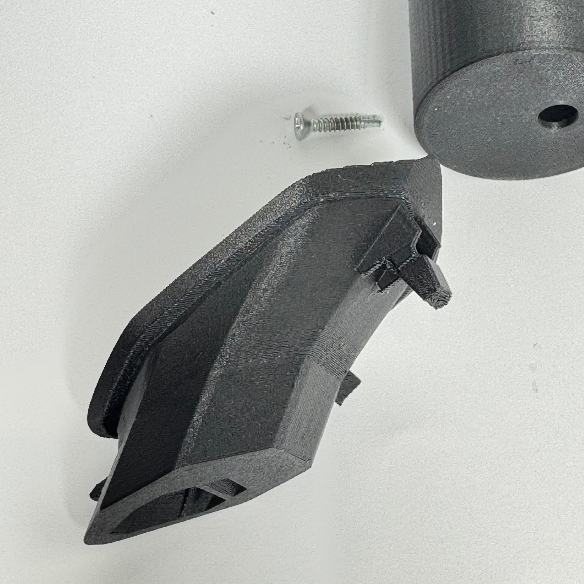 Underside of Toyota GR86 gauge pod showing included mounting screw